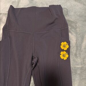 Lululemon Athletica Black Leggings with Yellow Floral Design